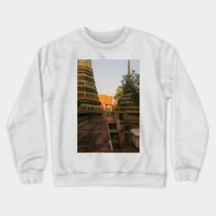 Second sidewalk view to ornate roof, flanked from parts of Chedis at Wat Pho. Crewneck Sweatshirt